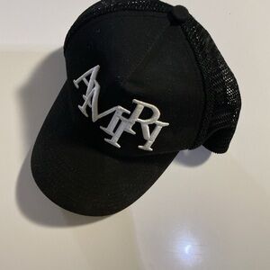 AMIRI Black and White Logo Trucker Hat